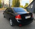 Чорний Кіа Черато, об'ємом двигуна 1.6 л та пробігом 237 тис. км за 5300 $, фото 13 на Automoto.ua