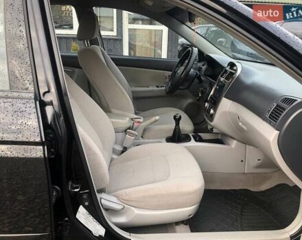 Чорний Кіа Черато, об'ємом двигуна 2 л та пробігом 177 тис. км за 4399 $, фото 22 на Automoto.ua