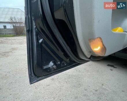 Черный Киа Черато, объемом двигателя 2 л и пробегом 318 тыс. км за 3900 $, фото 14 на Automoto.ua