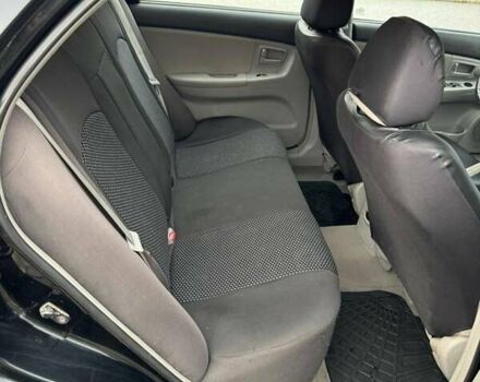 Чорний Кіа Черато, об'ємом двигуна 1.98 л та пробігом 177 тис. км за 3950 $, фото 6 на Automoto.ua