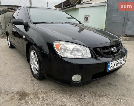 Черный Киа Черато, объемом двигателя 2 л и пробегом 318 тыс. км за 3900 $, фото 3 на Automoto.ua