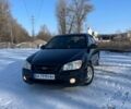 Чорний Кіа Черато, об'ємом двигуна 1.6 л та пробігом 282 тис. км за 3750 $, фото 1 на Automoto.ua