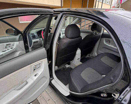 Черный Киа Черато, объемом двигателя 1.6 л и пробегом 232 тыс. км за 4300 $, фото 12 на Automoto.ua