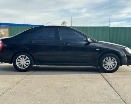 Черный Киа Черато, объемом двигателя 1.6 л и пробегом 245 тыс. км за 2850 $, фото 2 на Automoto.ua