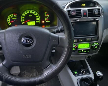 Черный Киа Черато, объемом двигателя 2 л и пробегом 240 тыс. км за 3300 $, фото 6 на Automoto.ua