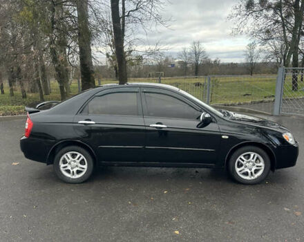 Черный Киа Черато, объемом двигателя 1.98 л и пробегом 236 тыс. км за 4100 $, фото 3 на Automoto.ua