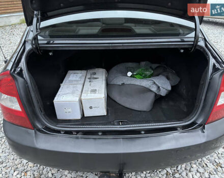 Черный Киа Черато, объемом двигателя 1.6 л и пробегом 220 тыс. км за 3300 $, фото 19 на Automoto.ua