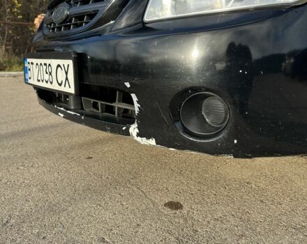 Черный Киа Черато, объемом двигателя 1.6 л и пробегом 245 тыс. км за 2850 $, фото 5 на Automoto.ua