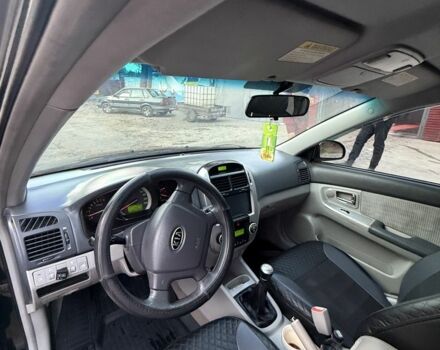 Черный Киа Черато, объемом двигателя 1.6 л и пробегом 286 тыс. км за 3500 $, фото 6 на Automoto.ua