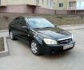 Черный Киа Черато, объемом двигателя 1.6 л и пробегом 220 тыс. км за 5400 $, фото 3 на Automoto.ua