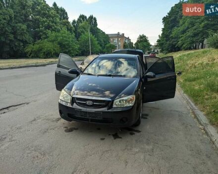 Чорний Кіа Черато, об'ємом двигуна 1.5 л та пробігом 221 тис. км за 4200 $, фото 10 на Automoto.ua