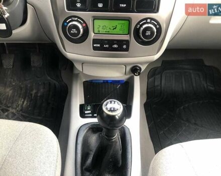 Чорний Кіа Черато, об'ємом двигуна 2 л та пробігом 177 тис. км за 4399 $, фото 25 на Automoto.ua