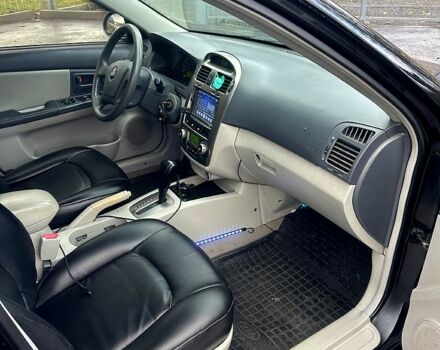 Черный Киа Черато, объемом двигателя 2 л и пробегом 232 тыс. км за 4100 $, фото 10 на Automoto.ua