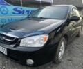 Черный Киа Черато, объемом двигателя 2 л и пробегом 240 тыс. км за 3300 $, фото 4 на Automoto.ua