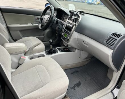 Черный Киа Черато, объемом двигателя 1.6 л и пробегом 230 тыс. км за 3200 $, фото 13 на Automoto.ua