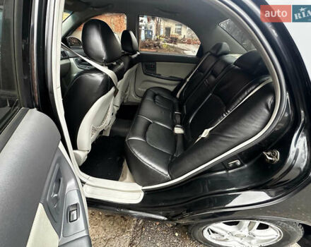 Чорний Кіа Черато, об'ємом двигуна 1.98 л та пробігом 240 тис. км за 5100 $, фото 8 на Automoto.ua