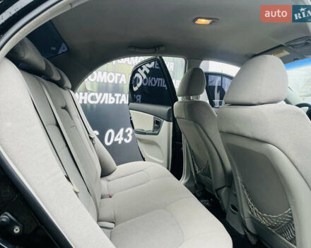 Чорний Кіа Черато, об'ємом двигуна 2 л та пробігом 319 тис. км за 4300 $, фото 16 на Automoto.ua