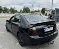 Чорний Кіа Черато, об'ємом двигуна 2 л та пробігом 369 тис. км за 2861 $, фото 1 на Automoto.ua