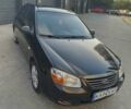 Чорний Кіа Черато, об'ємом двигуна 1.6 л та пробігом 237 тис. км за 5300 $, фото 1 на Automoto.ua