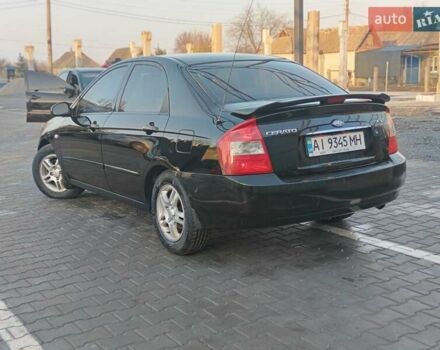 Черный Киа Черато, объемом двигателя 1.6 л и пробегом 230 тыс. км за 4250 $, фото 10 на Automoto.ua