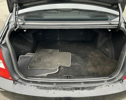 Черный Киа Черато, объемом двигателя 1.6 л и пробегом 230 тыс. км за 3200 $, фото 19 на Automoto.ua