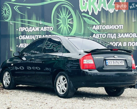 Чорний Кіа Черато, об'ємом двигуна 2 л та пробігом 319 тис. км за 4300 $, фото 7 на Automoto.ua