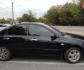 Черный Киа Черато, объемом двигателя 1.6 л и пробегом 290 тыс. км за 5000 $, фото 7 на Automoto.ua