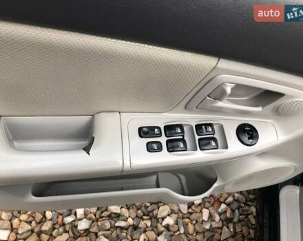 Чорний Кіа Черато, об'ємом двигуна 2 л та пробігом 177 тис. км за 4399 $, фото 10 на Automoto.ua