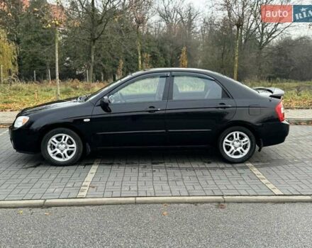 Чорний Кіа Черато, об'ємом двигуна 1.98 л та пробігом 177 тис. км за 3950 $, фото 5 на Automoto.ua