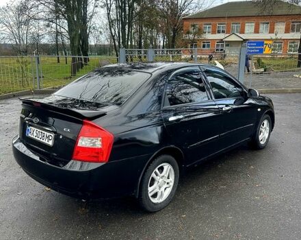 Черный Киа Черато, объемом двигателя 2 л и пробегом 232 тыс. км за 4100 $, фото 3 на Automoto.ua