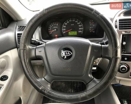 Чорний Кіа Черато, об'ємом двигуна 2 л та пробігом 177 тис. км за 4399 $, фото 27 на Automoto.ua