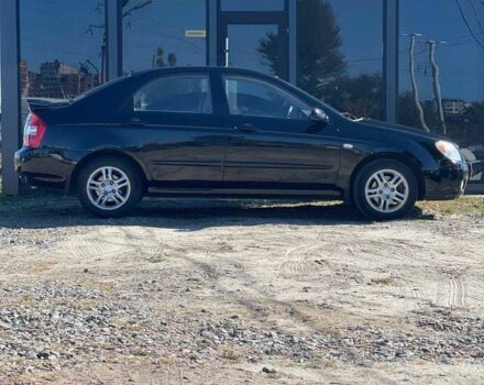 Черный Киа Черато, объемом двигателя 2 л и пробегом 268 тыс. км за 4200 $, фото 3 на Automoto.ua