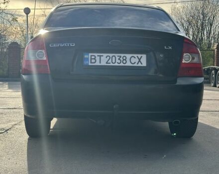 Черный Киа Черато, объемом двигателя 1.6 л и пробегом 245 тыс. км за 2850 $, фото 3 на Automoto.ua