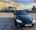 Чорний Кіа Черато, об'ємом двигуна 1.98 л та пробігом 229 тис. км за 2700 $, фото 1 на Automoto.ua