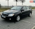 Чорний Кіа Черато, об'ємом двигуна 1.98 л та пробігом 177 тис. км за 3950 $, фото 1 на Automoto.ua
