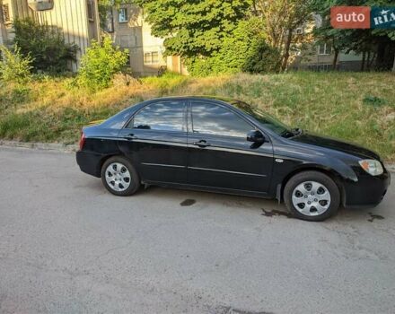 Чорний Кіа Черато, об'ємом двигуна 1.5 л та пробігом 221 тис. км за 4200 $, фото 7 на Automoto.ua