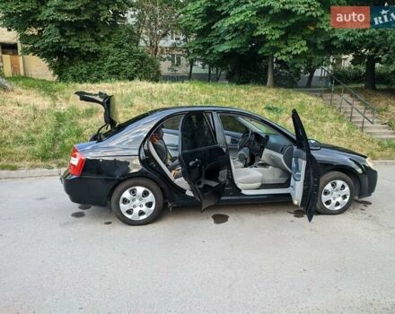 Чорний Кіа Черато, об'ємом двигуна 1.5 л та пробігом 221 тис. км за 4200 $, фото 2 на Automoto.ua