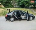 Чорний Кіа Черато, об'ємом двигуна 1.5 л та пробігом 221 тис. км за 4200 $, фото 2 на Automoto.ua