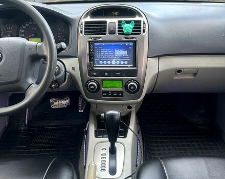 Черный Киа Черато, объемом двигателя 2 л и пробегом 232 тыс. км за 4100 $, фото 9 на Automoto.ua