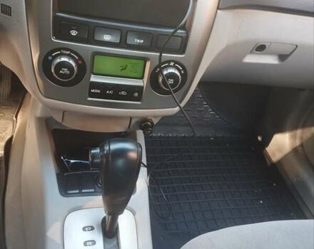 Черный Киа Черато, объемом двигателя 2 л и пробегом 220 тыс. км за 4900 $, фото 1 на Automoto.ua