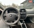 Черный Киа Черато, объемом двигателя 1.6 л и пробегом 210 тыс. км за 4500 $, фото 23 на Automoto.ua