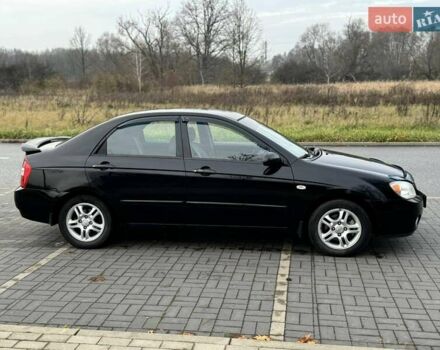 Чорний Кіа Черато, об'ємом двигуна 1.98 л та пробігом 177 тис. км за 3950 $, фото 10 на Automoto.ua