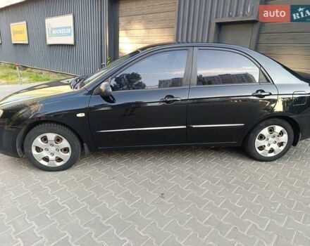 Чорний Кіа Черато, об'ємом двигуна 1.6 л та пробігом 237 тис. км за 5300 $, фото 12 на Automoto.ua