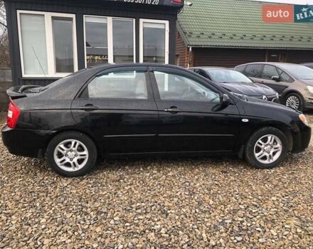 Чорний Кіа Черато, об'ємом двигуна 2 л та пробігом 177 тис. км за 4399 $, фото 8 на Automoto.ua