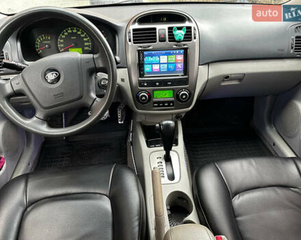 Чорний Кіа Черато, об'ємом двигуна 1.98 л та пробігом 240 тис. км за 5100 $, фото 11 на Automoto.ua