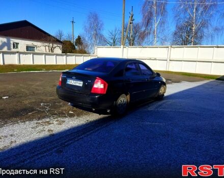Чорний Кіа Черато, об'ємом двигуна 1.6 л та пробігом 0 тис. км за 4100 $, фото 9 на Automoto.ua