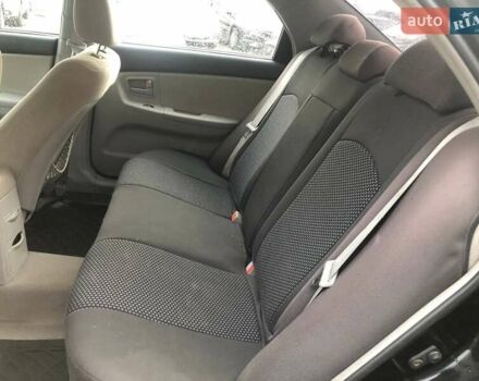 Чорний Кіа Черато, об'ємом двигуна 2 л та пробігом 177 тис. км за 4399 $, фото 16 на Automoto.ua