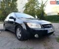 Чорний Кіа Черато, об'ємом двигуна 1.98 л та пробігом 230 тис. км за 4000 $, фото 1 на Automoto.ua