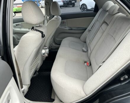 Черный Киа Черато, объемом двигателя 1.6 л и пробегом 230 тыс. км за 3200 $, фото 16 на Automoto.ua