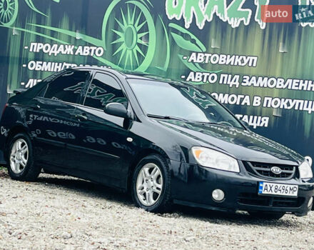 Чорний Кіа Черато, об'ємом двигуна 2 л та пробігом 319 тис. км за 4300 $, фото 4 на Automoto.ua